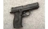 Smith & Wesson Model M&P9 w/Laser in 9mm - 1 of 2
