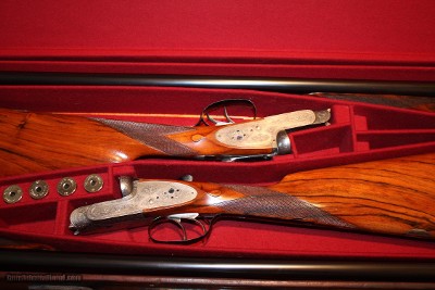 William Powell Pair of
12 Gauge Sidelock Ejector Game Guns with New Makers Stocks and Barrels