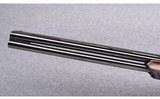 Benelli ~ Model 828U ~ 12 Gauge - 5 of 11