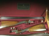 HOLLAND & HOLLAND Pair of boxlock
shotguns cased - 2 of 6