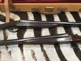 Holland & Holland
shot and regulated pair of 12 ga. Scott consecutive serial numbers original case - 8 of 15