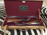 Holland & Holland
shot and regulated pair of 12 ga. Scott consecutive serial numbers original case - 1 of 15