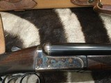Holland & Holland
shot and regulated pair of 12 ga. Scott consecutive serial numbers original case - 4 of 15
