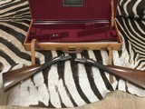 Holland & Holland
shot and regulated pair of 12 ga. Scott consecutive serial numbers original case - 2 of 15
