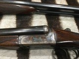 Holland & Holland
shot and regulated pair of 12 ga. Scott consecutive serial numbers original case - 10 of 15