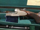 Johan Fanzoj
sidelock
best quality double rifle in 375 H&H Mag. - 3 of 14