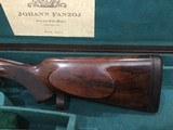 Johan Fanzoj
sidelock
best quality double rifle in 375 H&H Mag. - 11 of 14