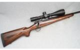 Winchester Model 70 with Cabelas Scope, .300 WSM - 1 of 8