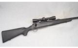 Winchester Model 70 with Leupold Scope, .375 H&H Mag. - 1 of 9