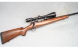 Winchester Model 70 with Swarovski Scope, .300 WSM - 1 of 8