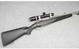 Winchester Model 70 with Swarovski Scope, .416 Rem. Mag. - 1 of 9