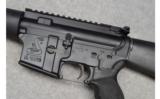 Bushmaster XM-15-E2S with 3 Uppers - 4 of 9