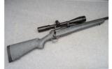 Winchester Model 70 with Tasco Scope, 7mm Rem. Mag - 1 of 9