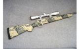 Kimber 84L in Digital Camo with Leupold Scope, .280 Ack. Imp. - 1 of 9