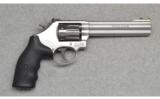 Smith & Wesson ~ 617-6 ~ .22LR - 1 of 2