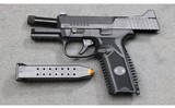 FN ~ Model 10 ~ 10 mm Auto - 2 of 3