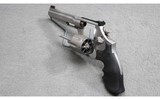 Smith & Wesson ~ Model 986 Pro Series ~ 9mm Luger - 2 of 3
