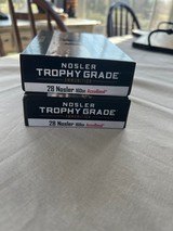 Nosler Trophy Grade 28 Nosler 160gr AccuBond rifle ammunition 40 rds - 1 of 2