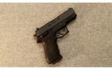 Sig Sauer P220
.45 ACP with .22 LR Conversion Kit and Crimson Trace laser - 1 of 5