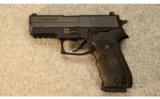 Sig Sauer P220
.45 ACP with .22 LR Conversion Kit and Crimson Trace laser - 2 of 5