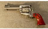 Ruger New Model Blackhawk Stainless
.357 Mag. - 2 of 2