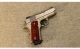 Colt Defender.45 ACP - 1 of 2