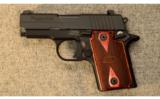Sig Sauer
P938 Rosewood
9mm - 2 of 3