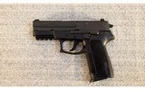 Sig Sauer ~ Model SP2022 ~ 9mm - 2 of 2