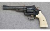 Smith & Wesson 19-4, .357 Mag.,
Engraved w/ Ivory Grips - 2 of 2