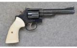 Smith & Wesson 19-4, .357 Mag.,
Engraved w/ Ivory Grips - 1 of 2