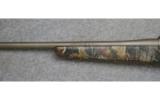 Thompson Center ICON,
.30 T/C., Stainless Camo. - 6 of 7