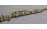 Thompson Center ICON,.30 T/C., Stainless Camo. - 1 of 7