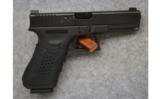 Glock ~ Model 22 ~ .40 S&W. - 1 of 2