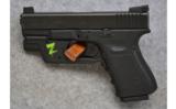 Glock ~ Model 23 ~ .40 S&W. - 2 of 2
