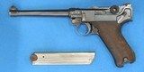 DWM NAVY
Luger,
P-08, Dated 1916, Cal. 9mm, Ser. 3234. This is a super find for the most critical collector. - 2 of 8