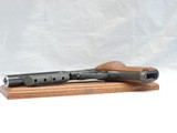 PRISTINE, HIGH STANDARD SUPERMATIC 107 CAL. .22LR, 7" BARREL, SER. 2074334. MFG. HAMDEN, CT. - 12 of 13