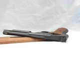PRISTINE, HIGH STANDARD SUPERMATIC 107 CAL. .22LR, 7" BARREL, SER. 2074334. MFG. HAMDEN, CT. - 11 of 13