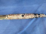 BARELY USED BENELLI SUPER NOVA. REAL TREE MAX-7 FINISH. CAL. 12 GAUGE. SER. Z679682H. 3 1/2" SHELLS - 16 of 17