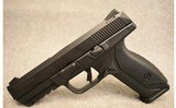 Sturm Ruger ~ American ~ 9mm Luger - 2 of 2