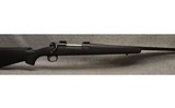 Winchester ~ Model 70 ~ 7mm Remington Magnum - 1 of 8