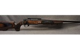 Weatherby ~ Vanguard ~ 7mm Remington Magnum - 1 of 8