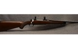 Ruger ~ M77 Mark II ~ .257 Roberts - 1 of 12