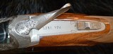 This is a Belgian made Browning Diana grade 20 gauge Superposed shotgun; one of THE finest guns made. It was manufactured in 1974 after the salt wood - 13 of 15