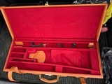 Leather case red felt lined with over straps