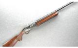 Remington 1100 Sporting Shotgun 12 GA - 1 of 7