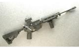 Bushmaster Model XM15-E2S Rifle 5.56 - 1 of 7