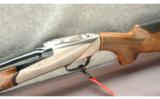 Benelli Model 828U Silver Shotgun 12 GA - 3 of 7