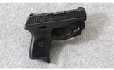 Ruger ~ LC9 Model 03200 with Laser ~ 9mm Para. - 1 of 3