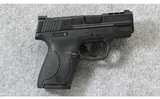Smith & Wesson ~ Performance Center Ported M&P 9 Shield ~ 9mm Para. - 1 of 7