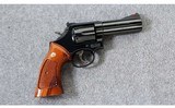 Smith & Wesson ~ Model 586 4 Inch ~ .357 Mag. - 1 of 7
